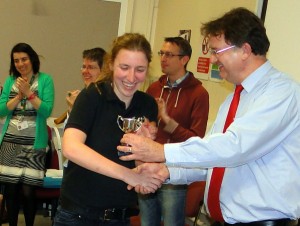 Jen Atherton receives the  Challenge Cup 2015  from President Garry Atterton on behalf of a Backwell School team.